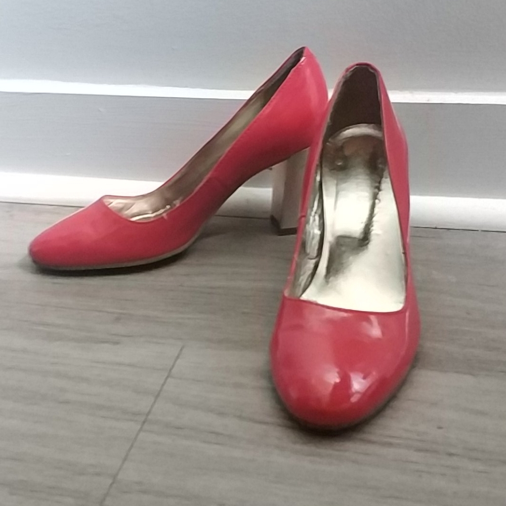 Vintage looking red P.I.U.R.E. shoes